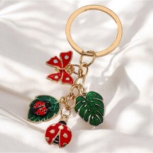 Gold Keychain with Red and Green Charms
